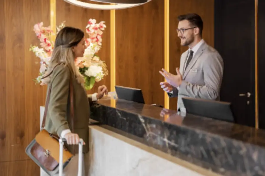 Front Desk Associate speaking with guest